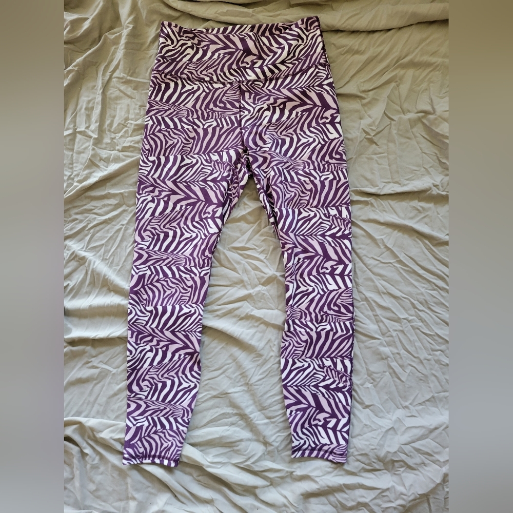 Fabletics powerhold purple zebra print leggings. Super soft and never worn!